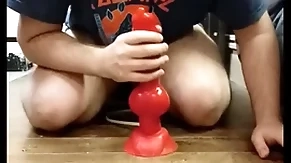 I play with my prominent dilto and i cum in my purity cage
