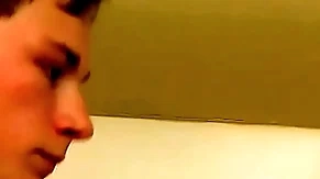Good looking twink plays adjacent to his dick in the shower solo